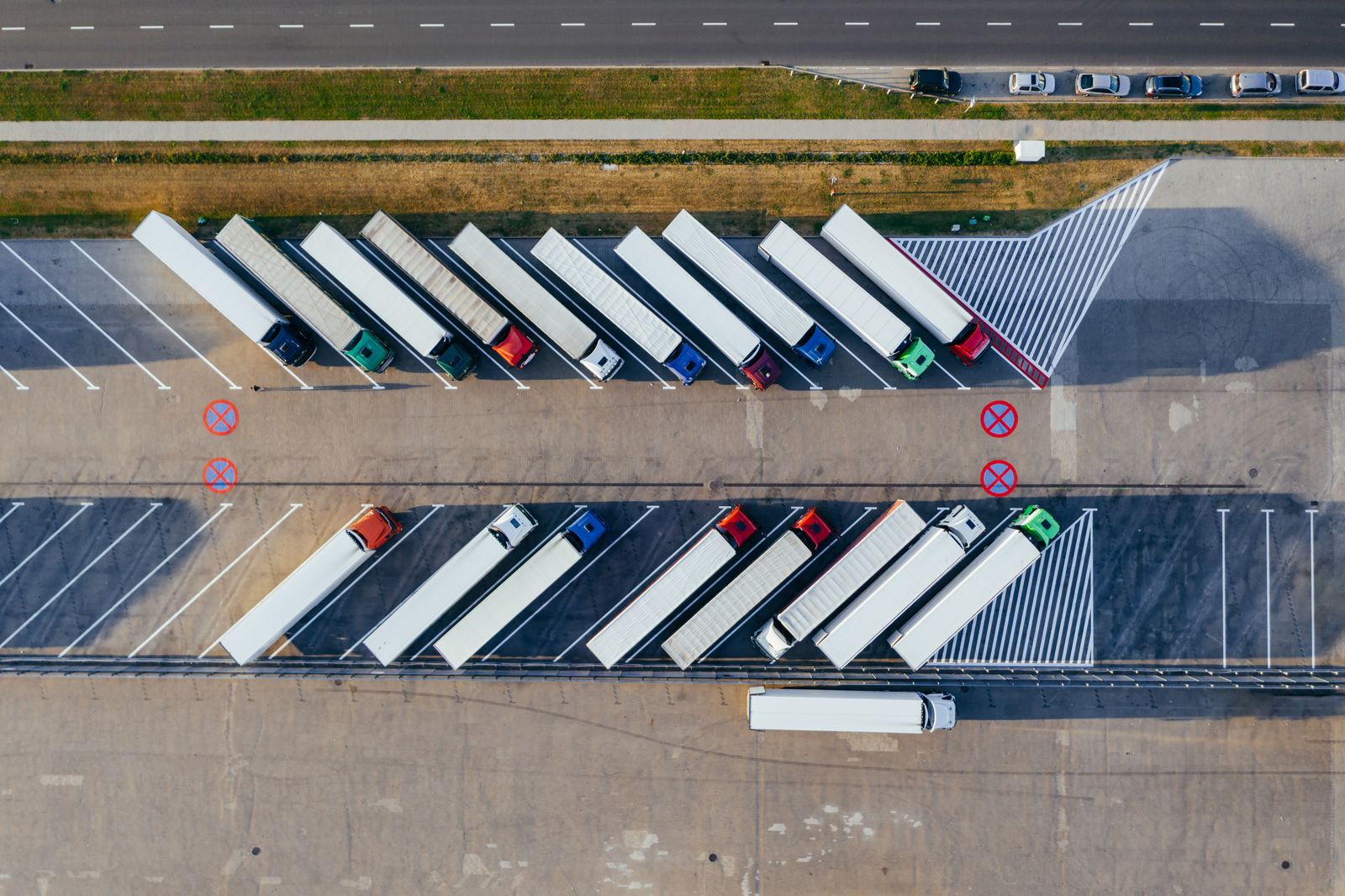 Aerial view of a truck yard with trailers lined up